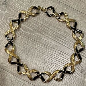 Vintage Monet 1980 Gold and Black Infinity Necklace with Polished Finish